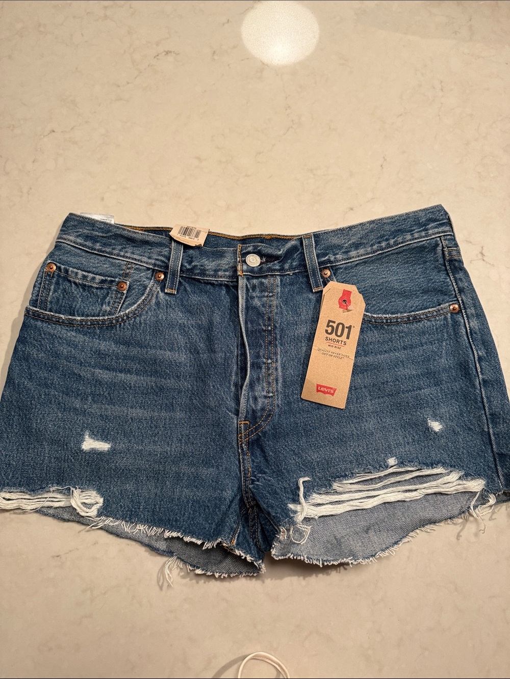 Levi's 501 Distressed Denim Shorts in Dark Blue